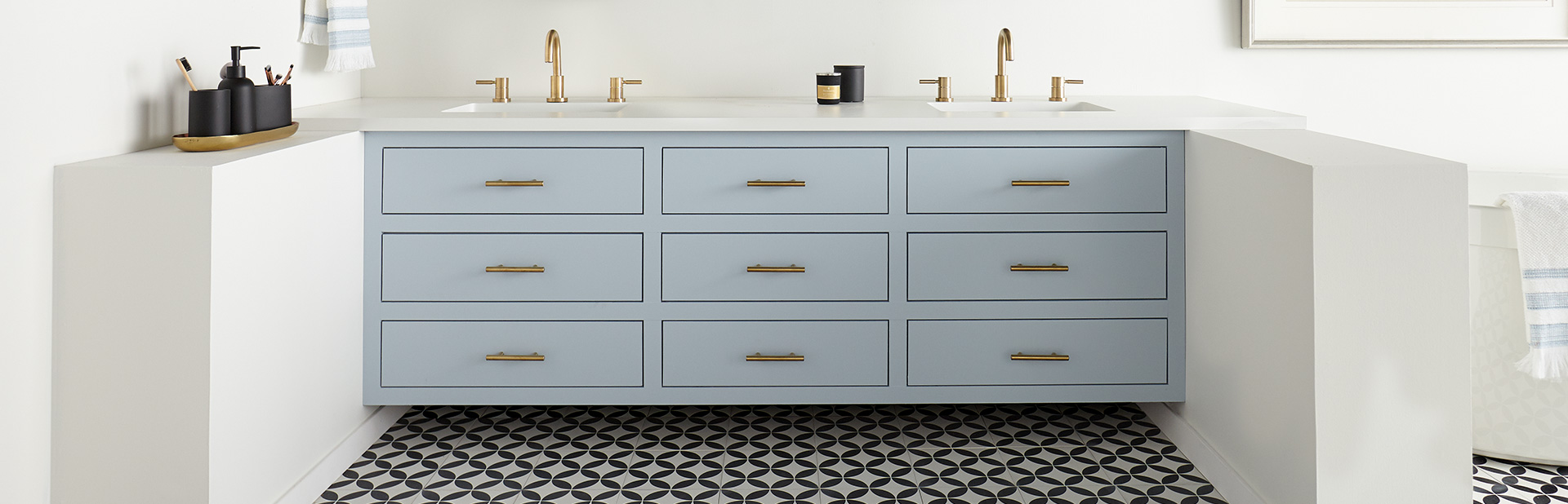 Bathroom with light blue cabinets