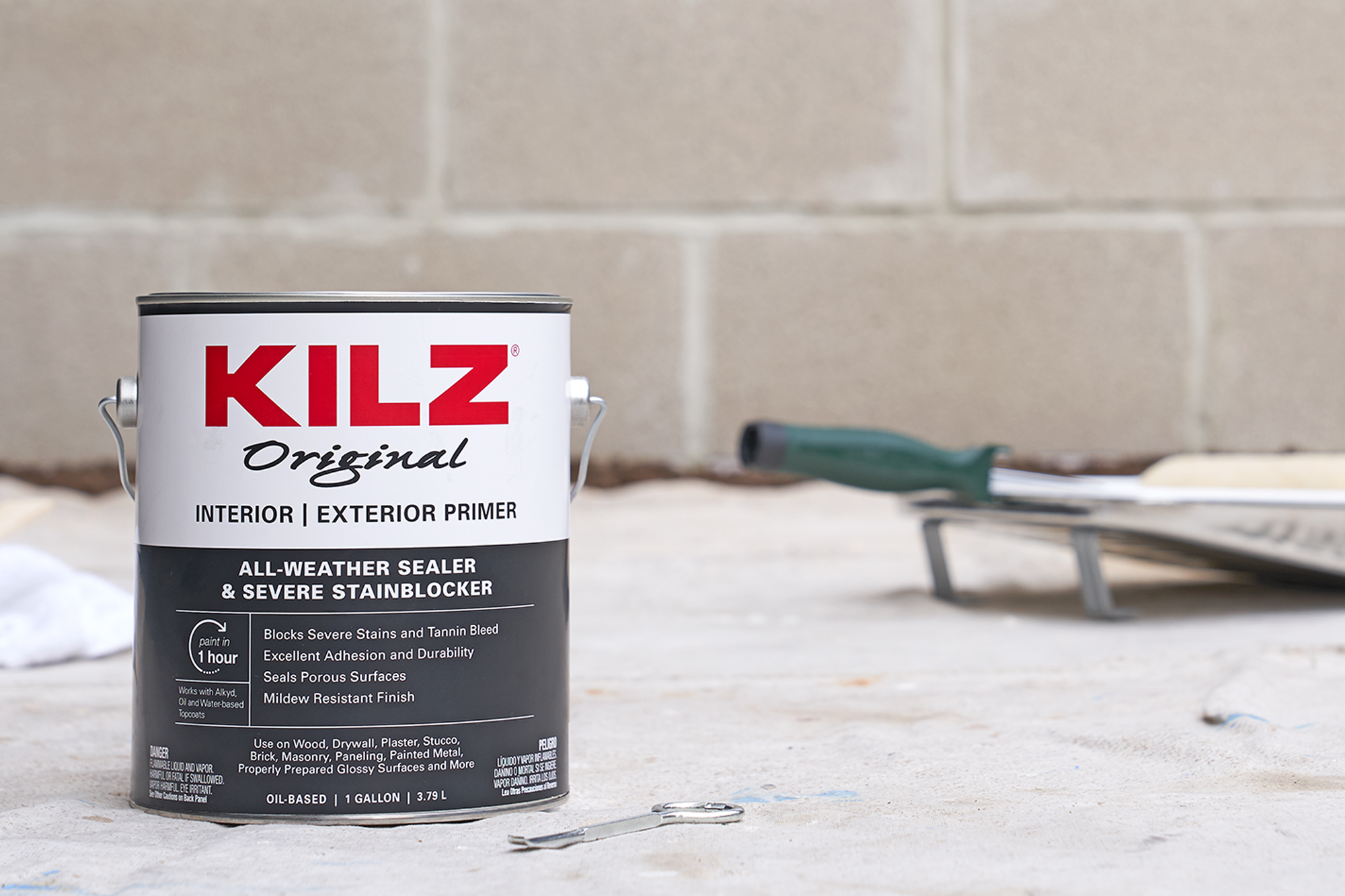 KILZ Original Interior/Exterior Primer sitting on a dropcloth