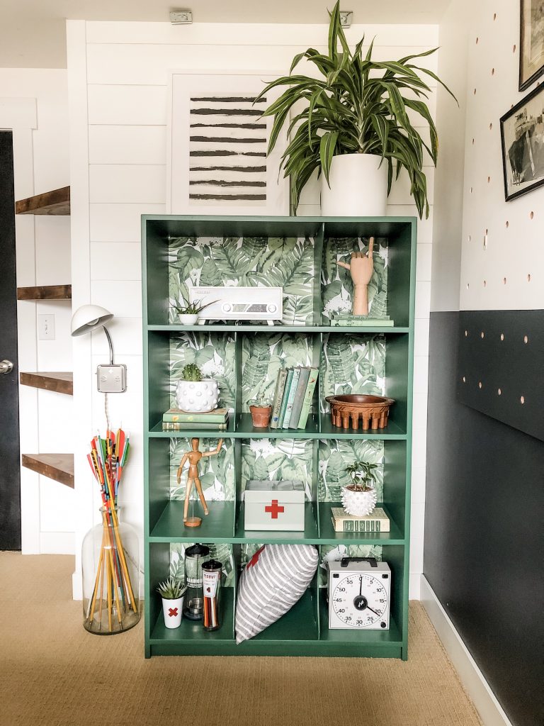Painted green organizer in entryway