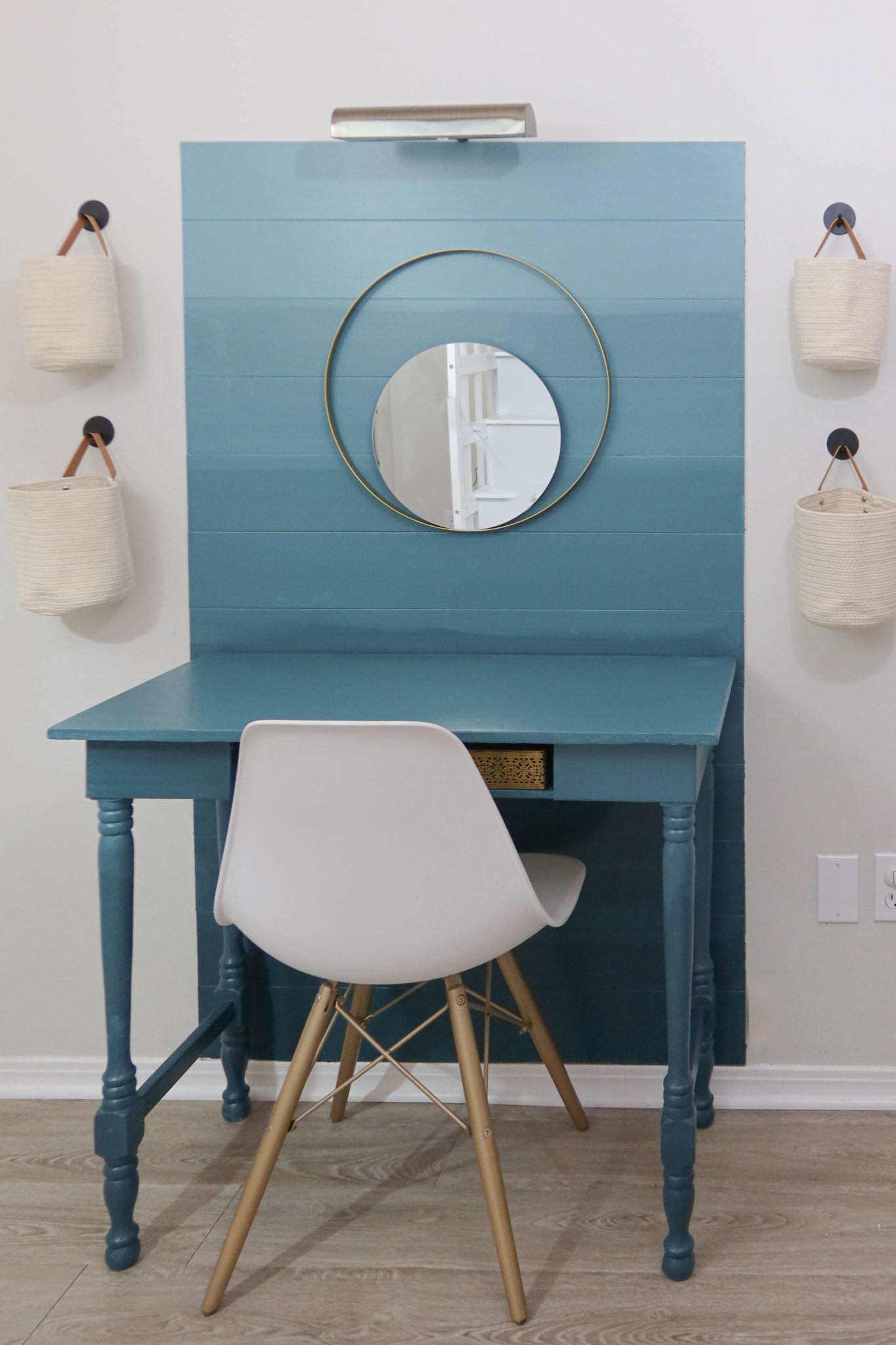 Blue ombre desk with white wall