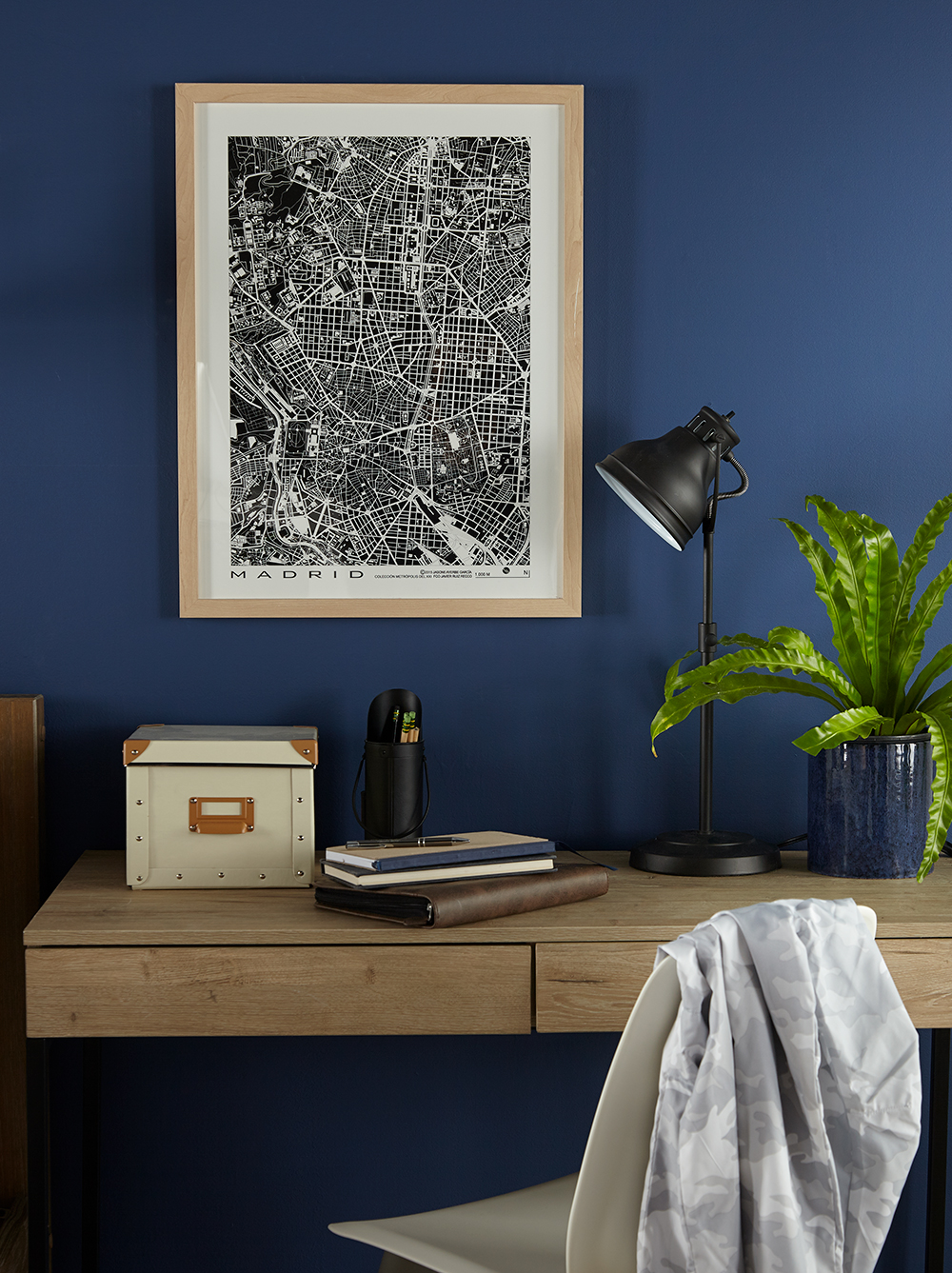 Bedroom office with blue wall