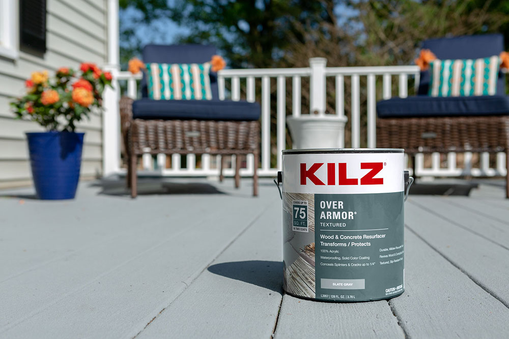 Kilz OverArmor Texture Slate Gray can on update deck in front of patio furniture 