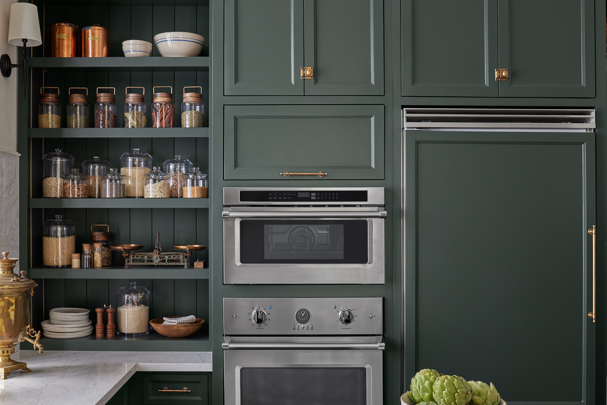 Detail image of cabinets that are painted using Magnolia Home by Joanna Gaines cabinet and trim paint, using the Castle Collection color Cottage Grove.