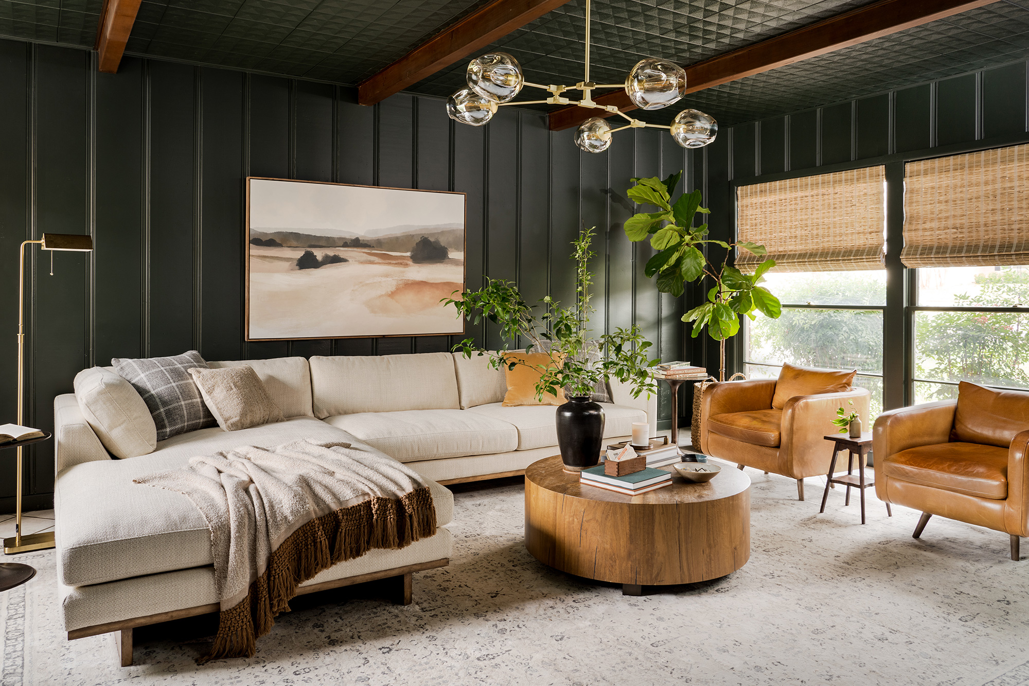 Living room image with Cottage Grove, a dark moody green color painted on the wall and ceilings.