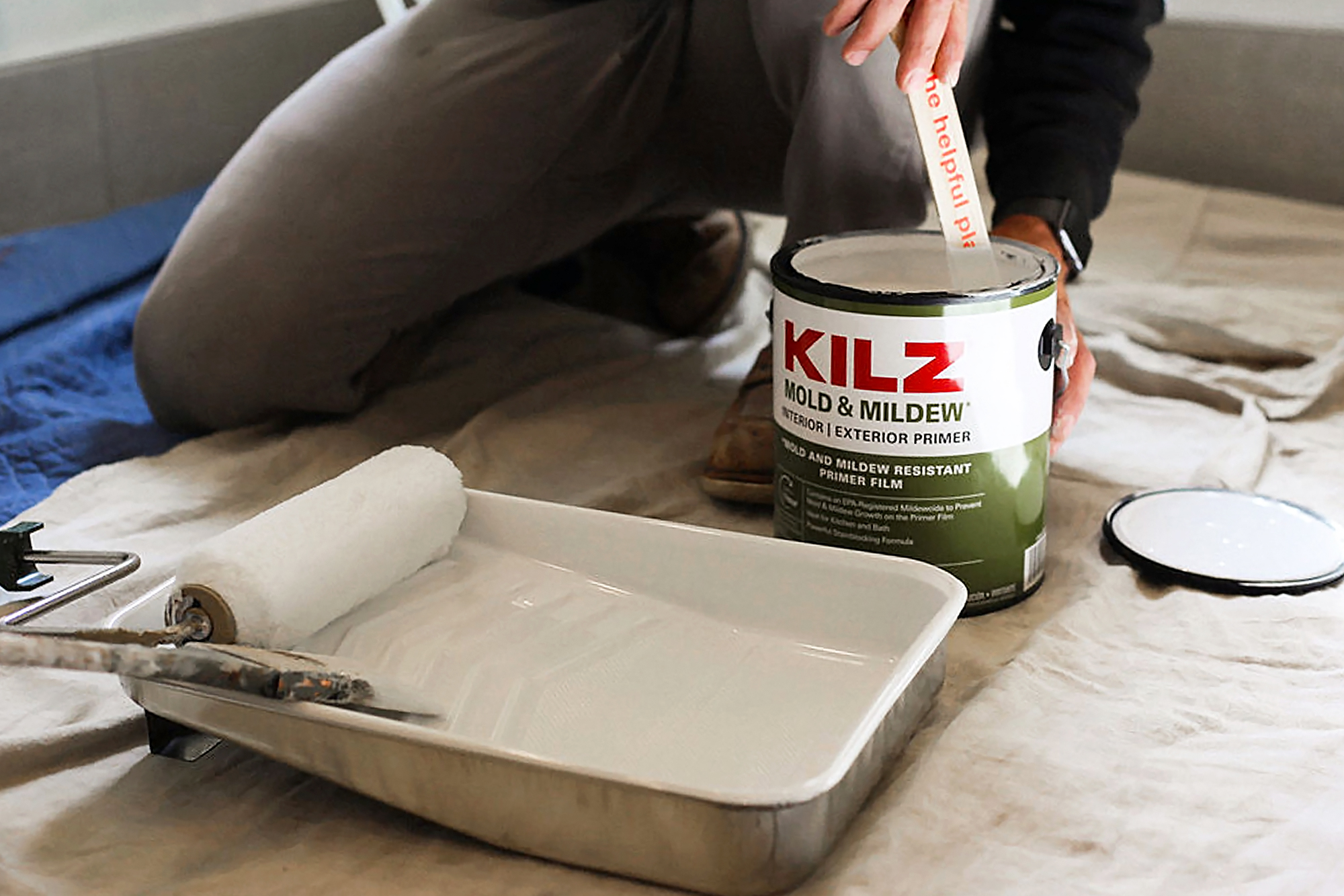 Mixing a can of KILZ Mold & Mildew primer.