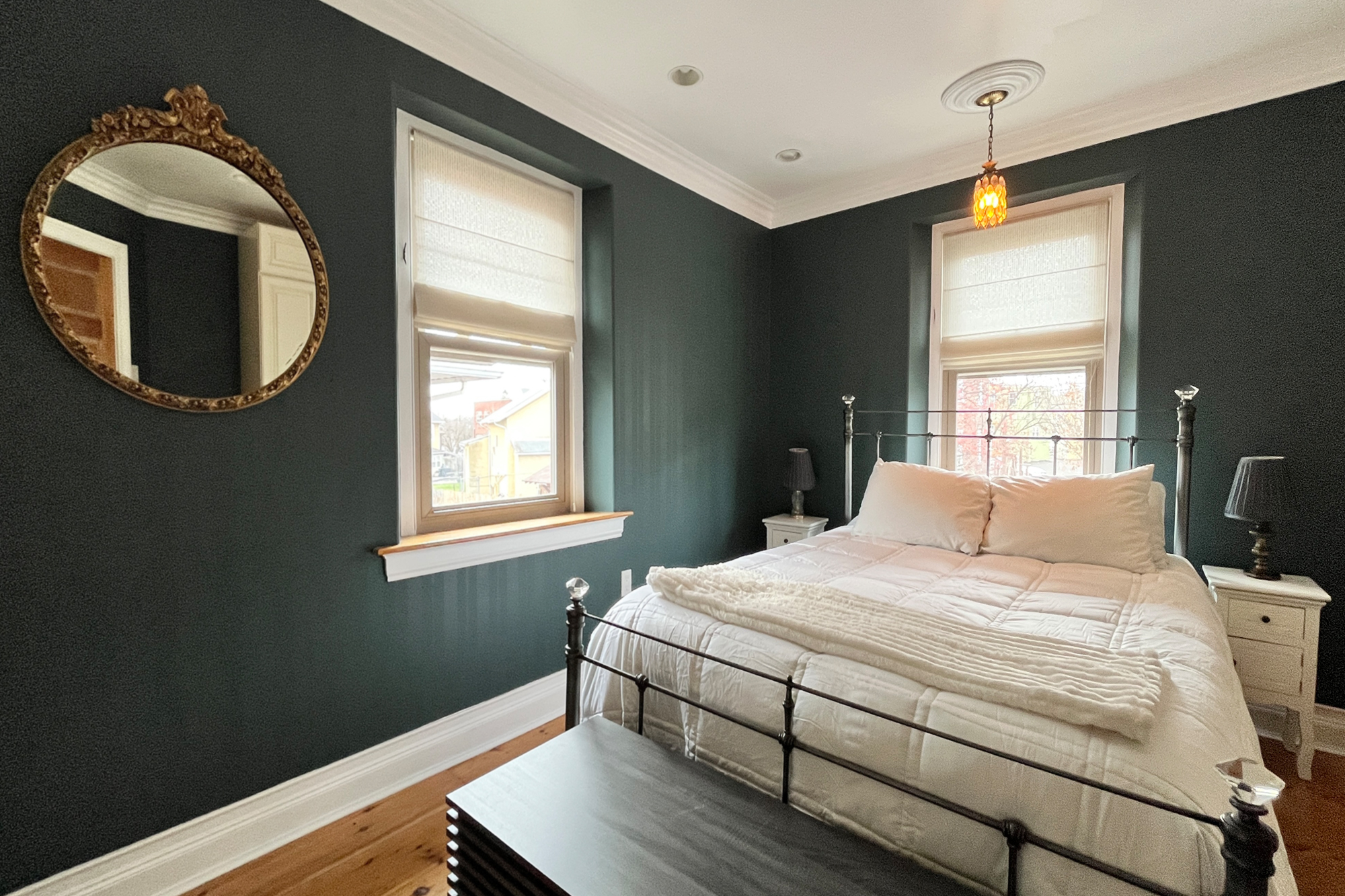 Green Bedroom with White Bed